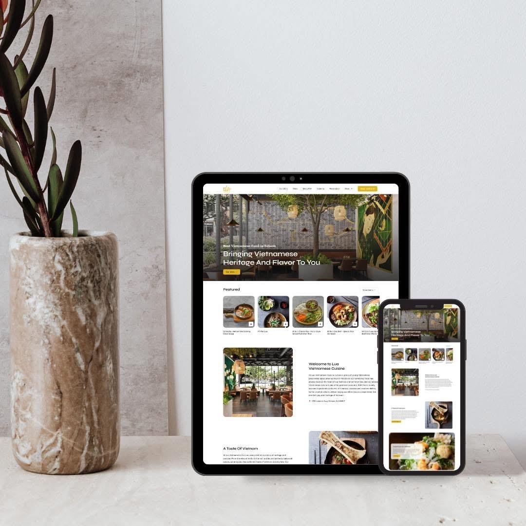 Vietnamese restaurant website shown on a tablet and a phone